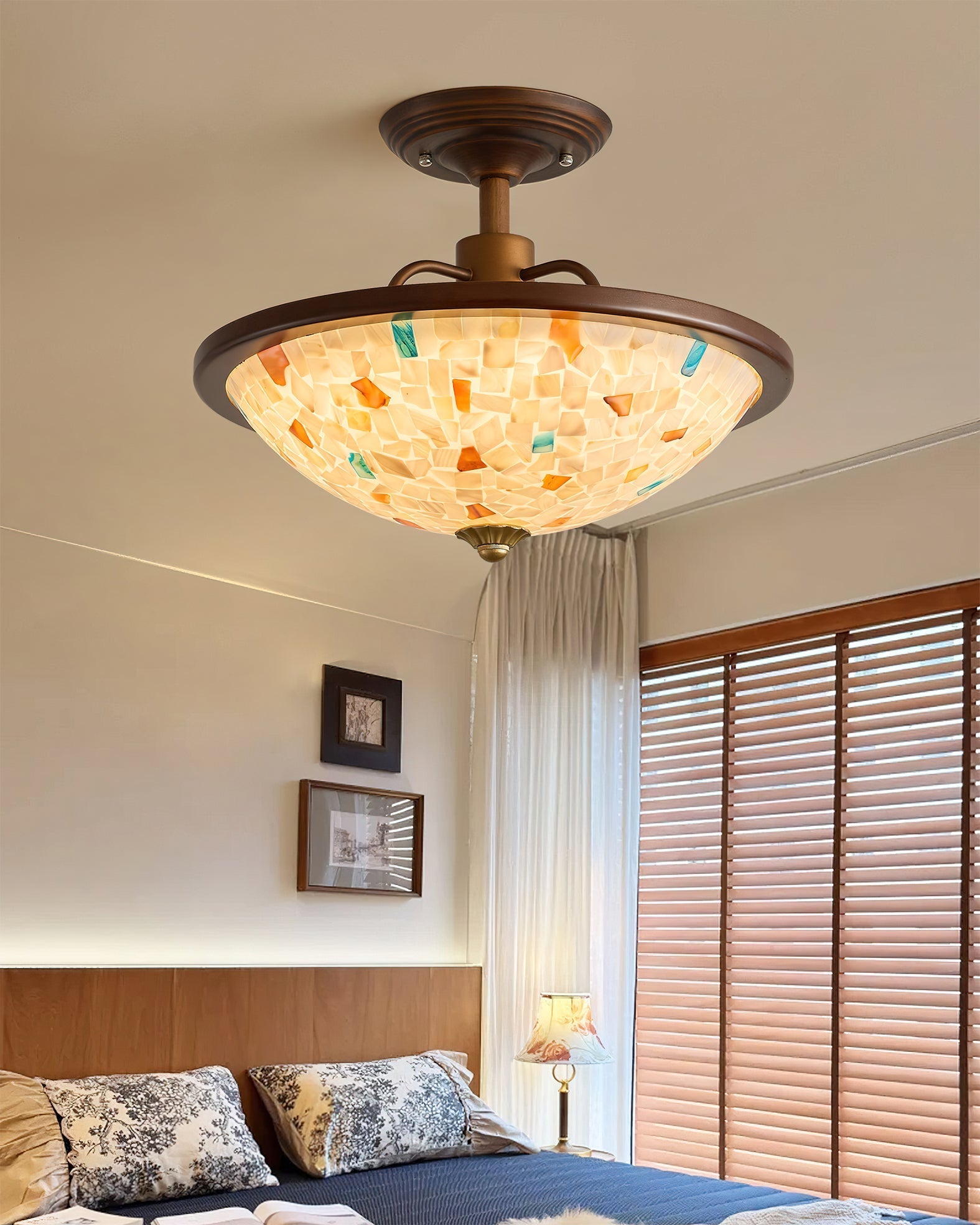 Close-up view of the hand-finished Capiz shell mosaic on the Monterey ceiling light.