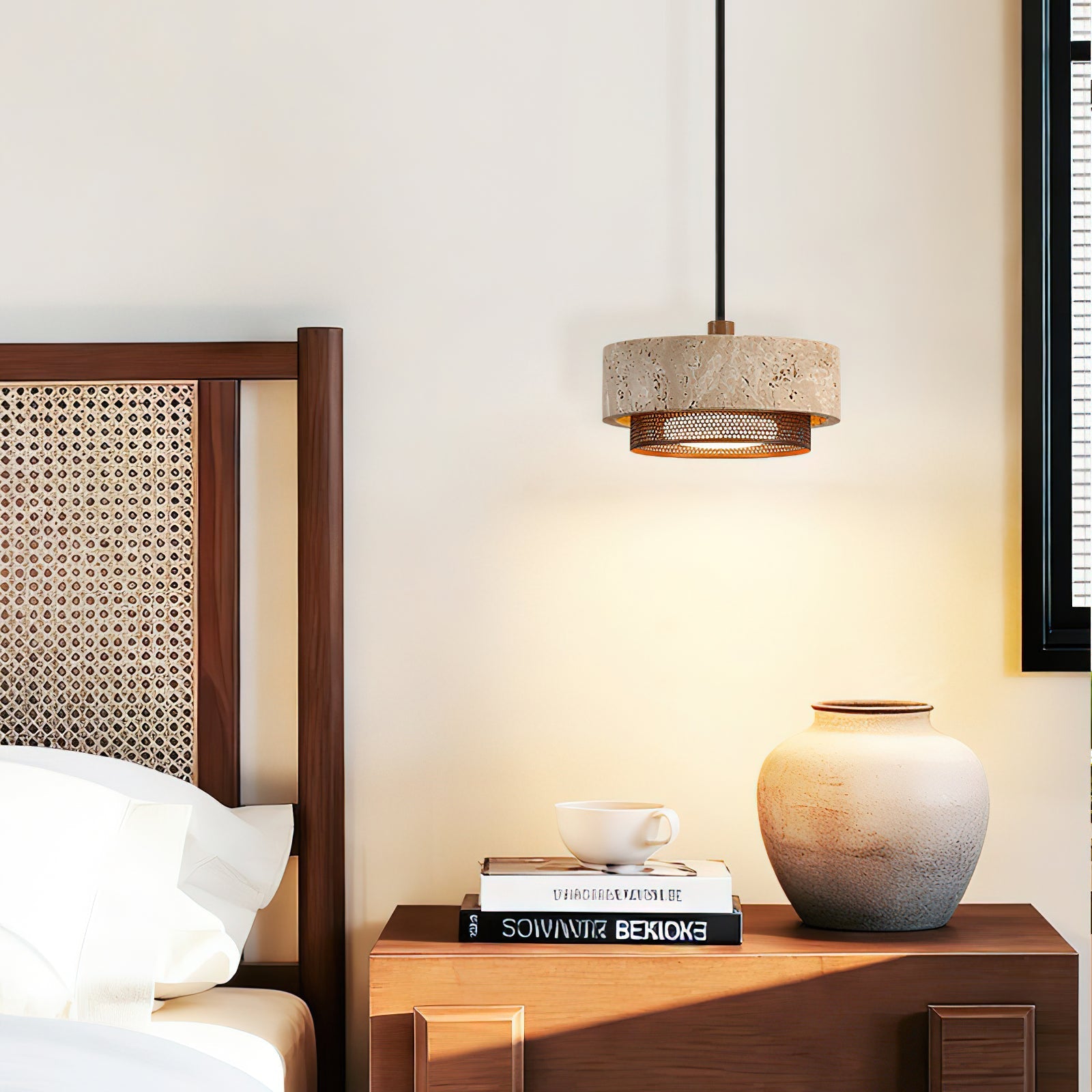 Detail shot of the metal and travertine components of the Nolan Pendant Light.