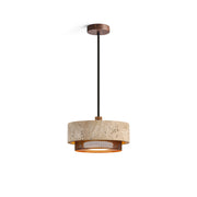 Nolan Pendant Light with a single beige travertine shade.