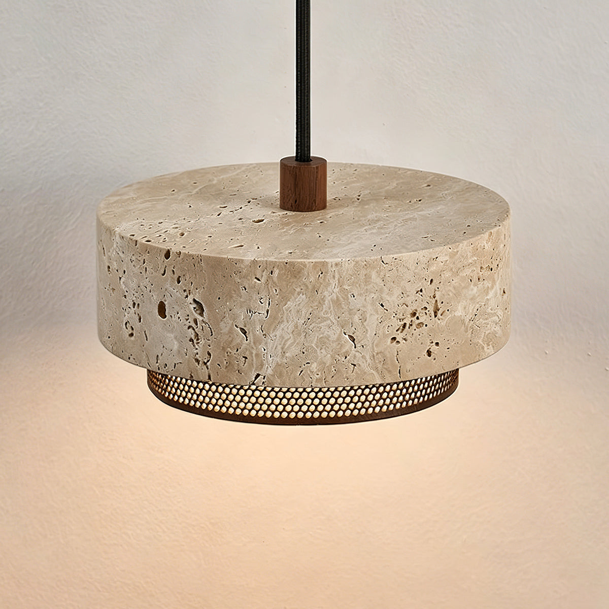 The 3-light Nolan Pendant Light hanging over a modern kitchen island.