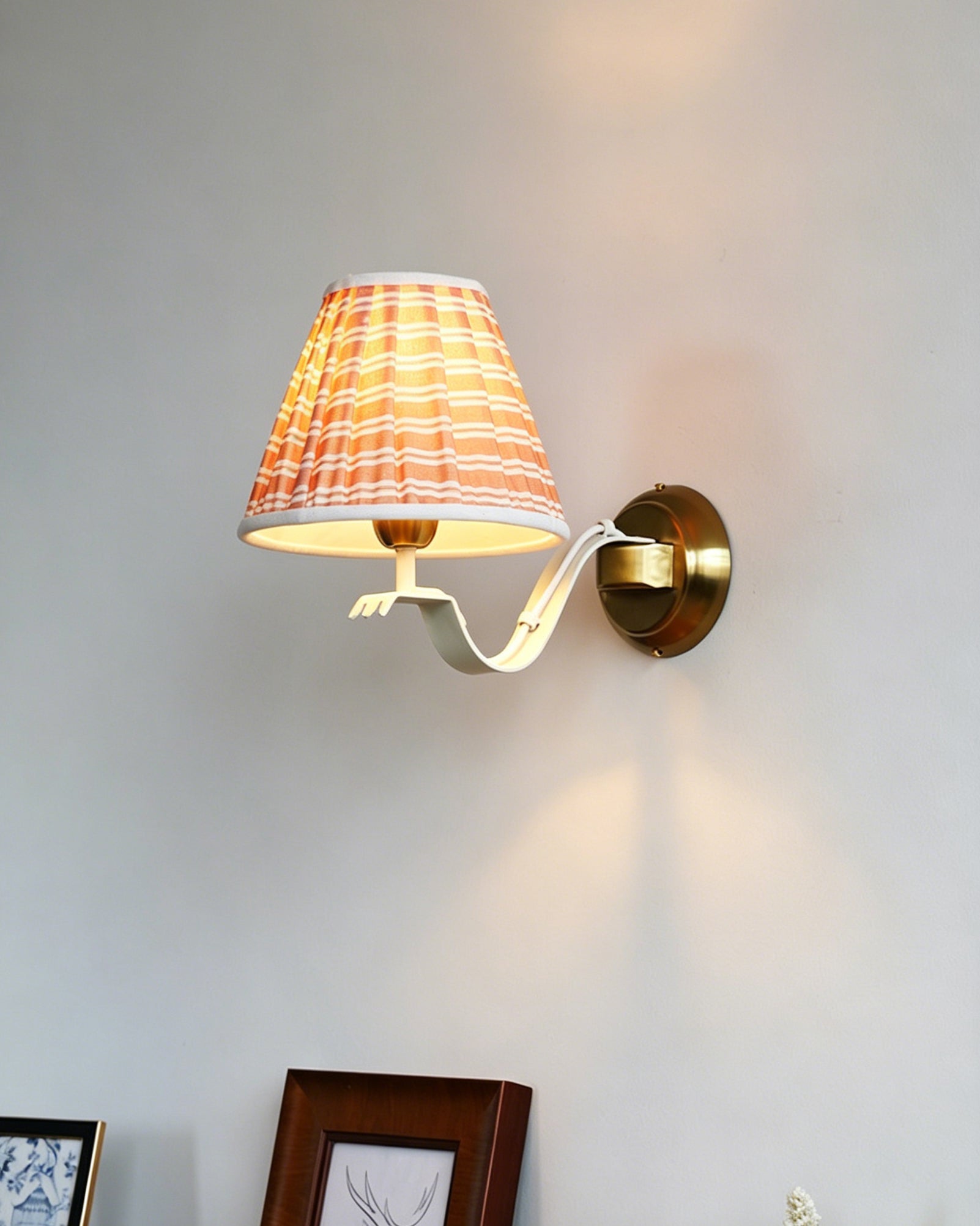 Another view of the sconce in a bedroom setting.