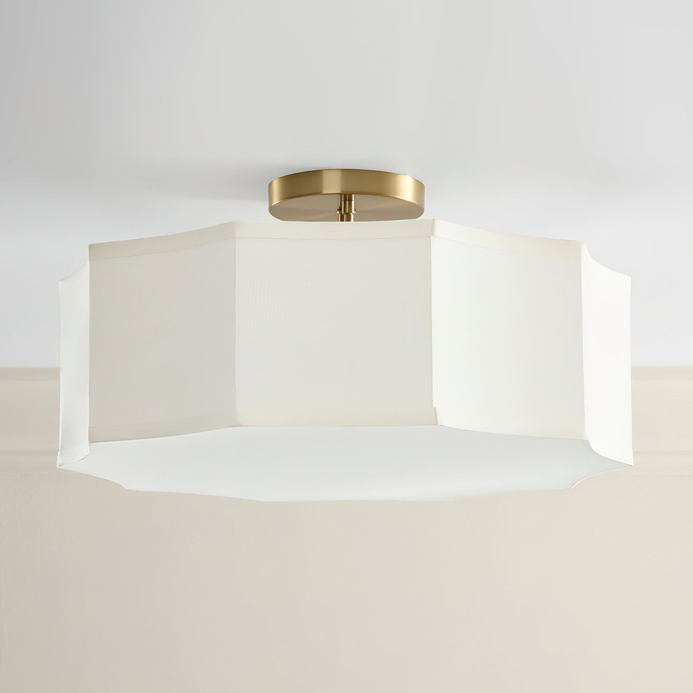 Prescott Linen Flush Mount installed in a modern traditional bedroom, providing warm ambient light.