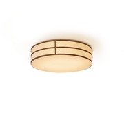 Ray LED Flush Mount shown in a modern bedroom with a low ceiling.