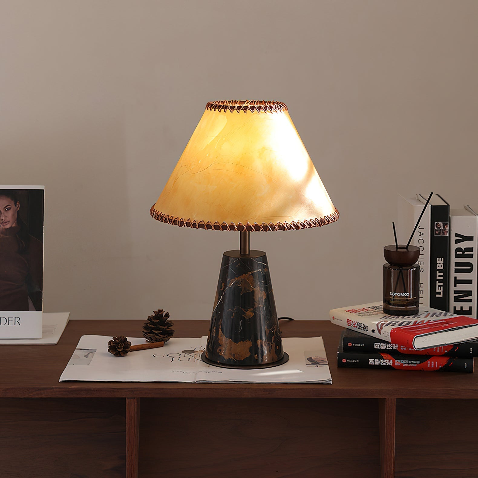 The table lamp illuminated, casting a warm, diffused ambient glow.