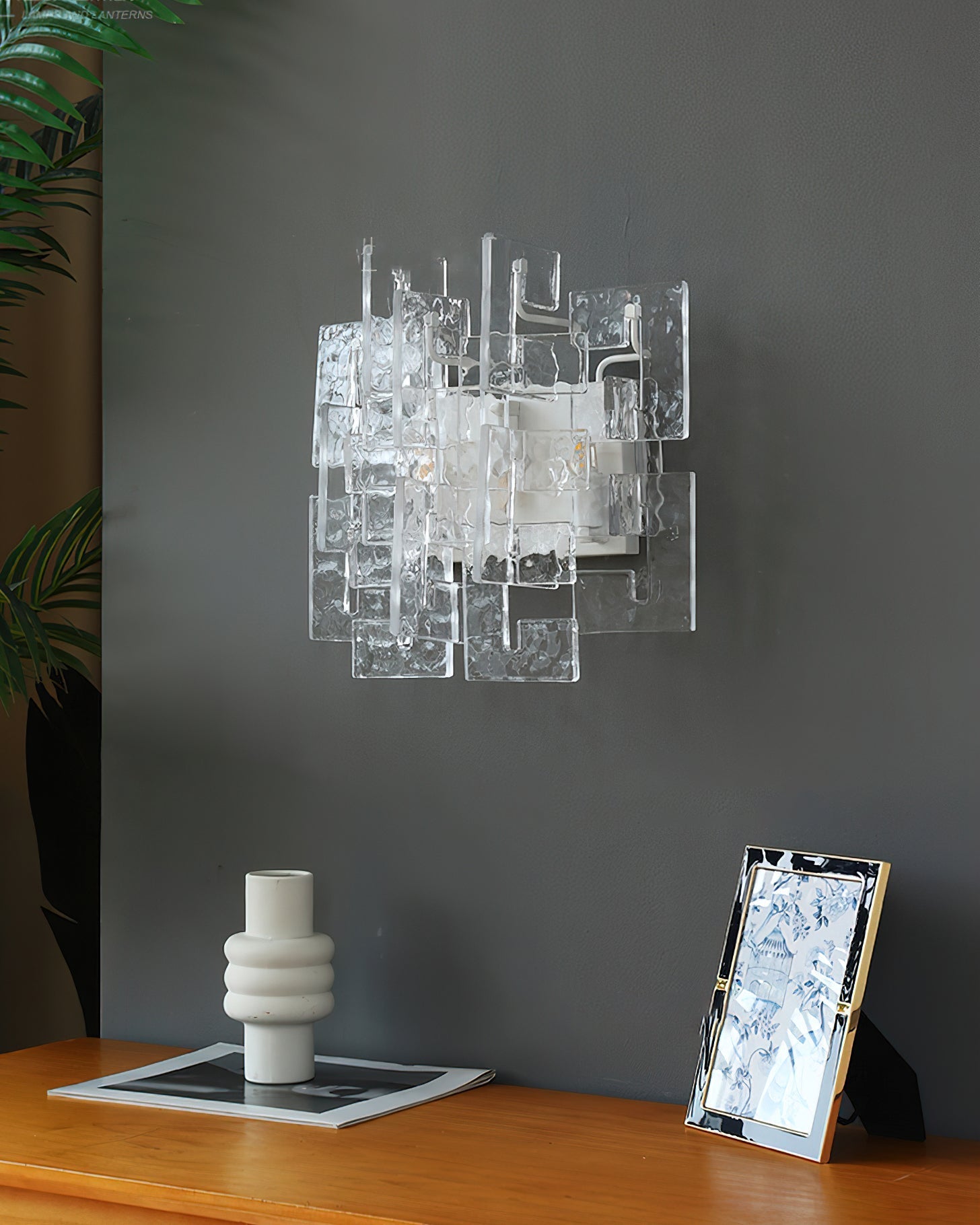 Lifestyle image featuring the sconce in a contemporary entryway.