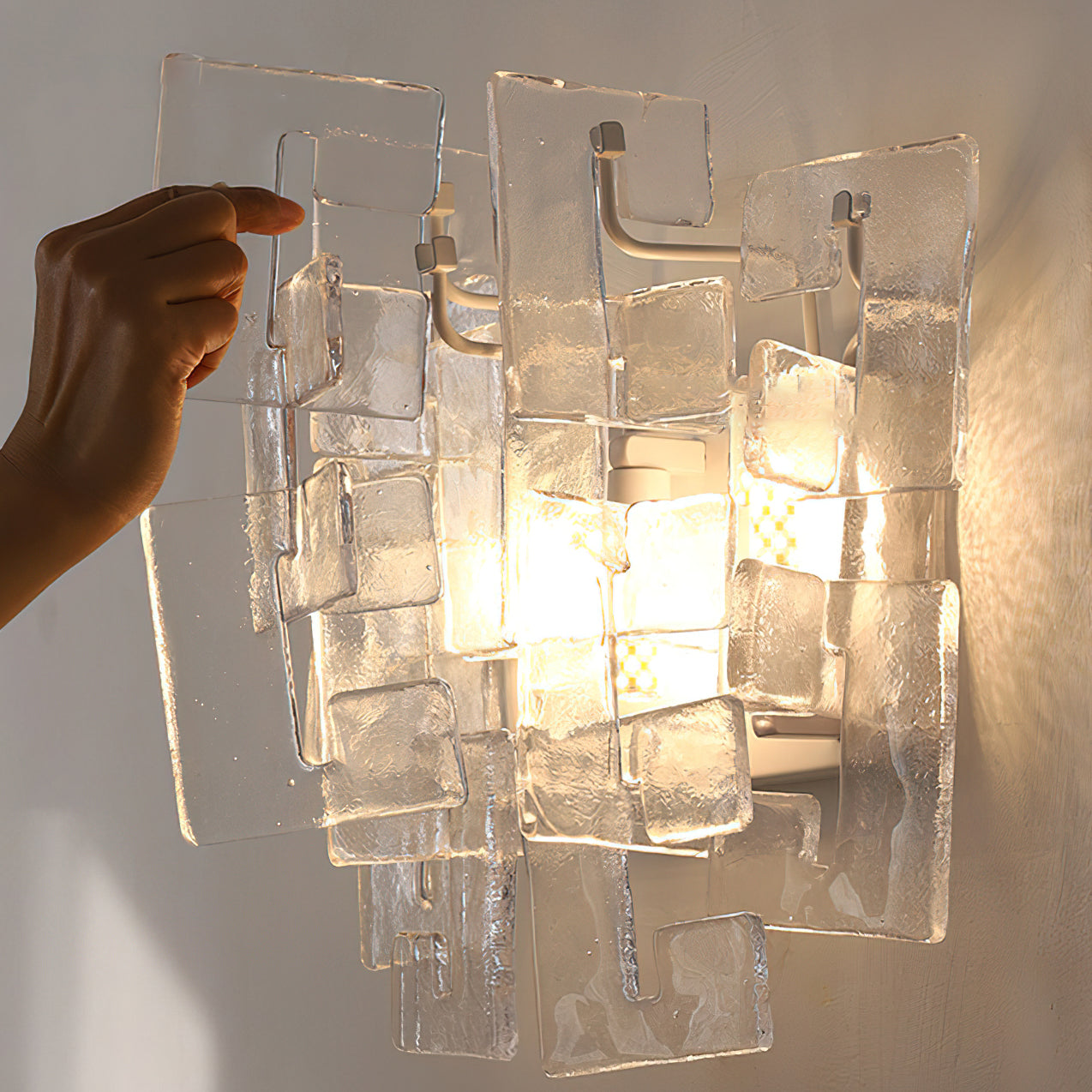 Front view of the Stagger Cast Glass Sconce in Blue finish.