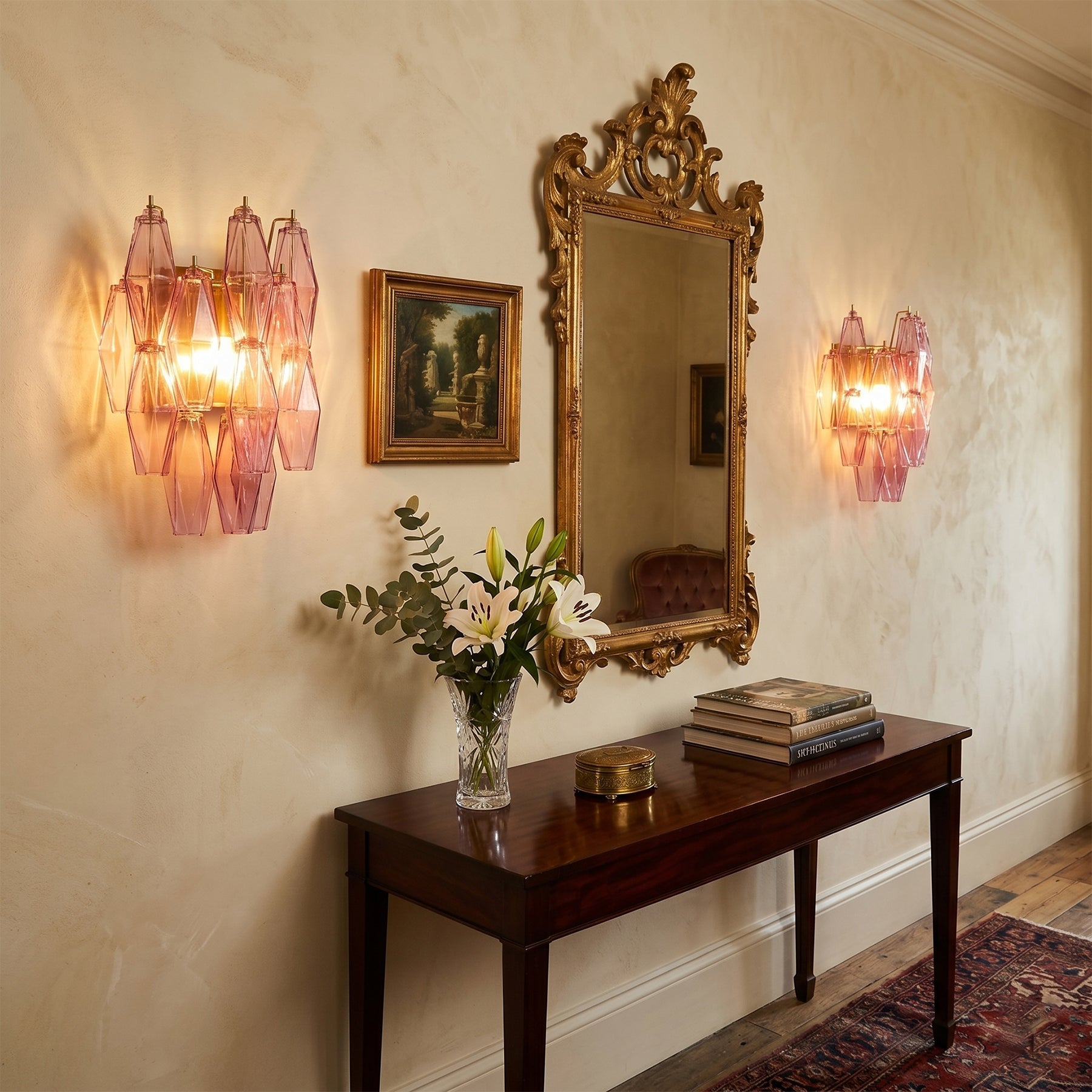 Gold glass Delano sconce in a luxurious bathroom.
