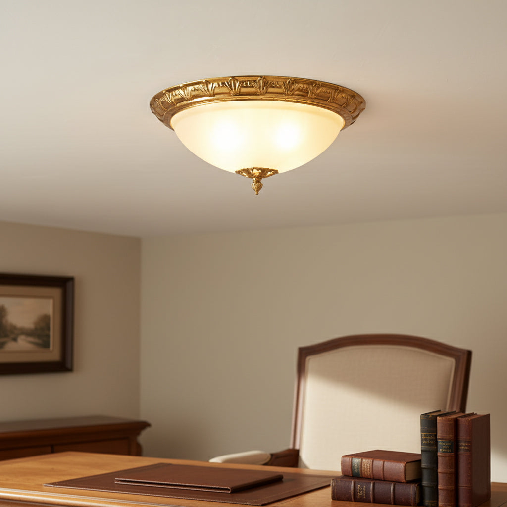 Close-up of the Deltana lamp's glass shades and brass body.