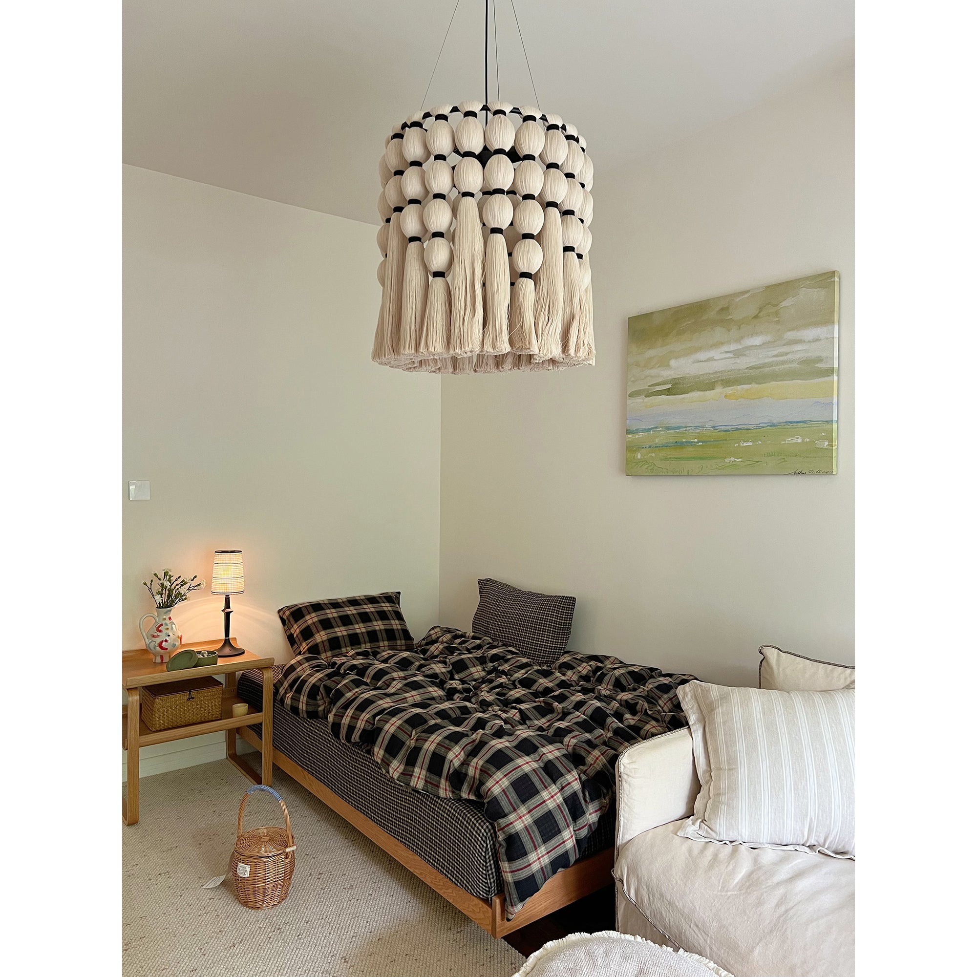 The warm light from the Devon lamp creating a cozy ambiance.