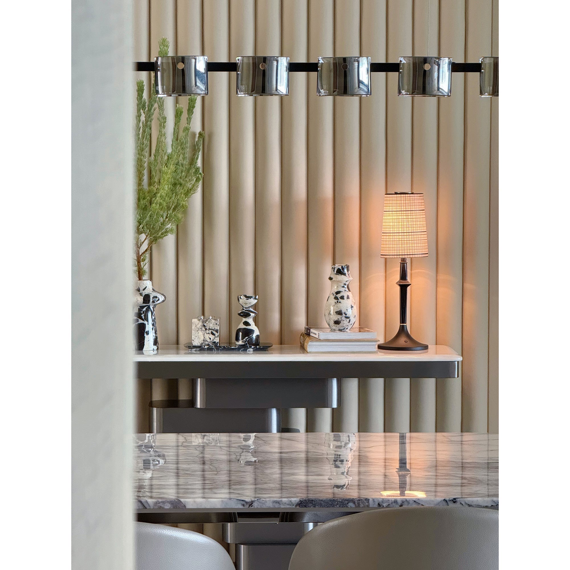 Another angle of the lamp in a living room setting.