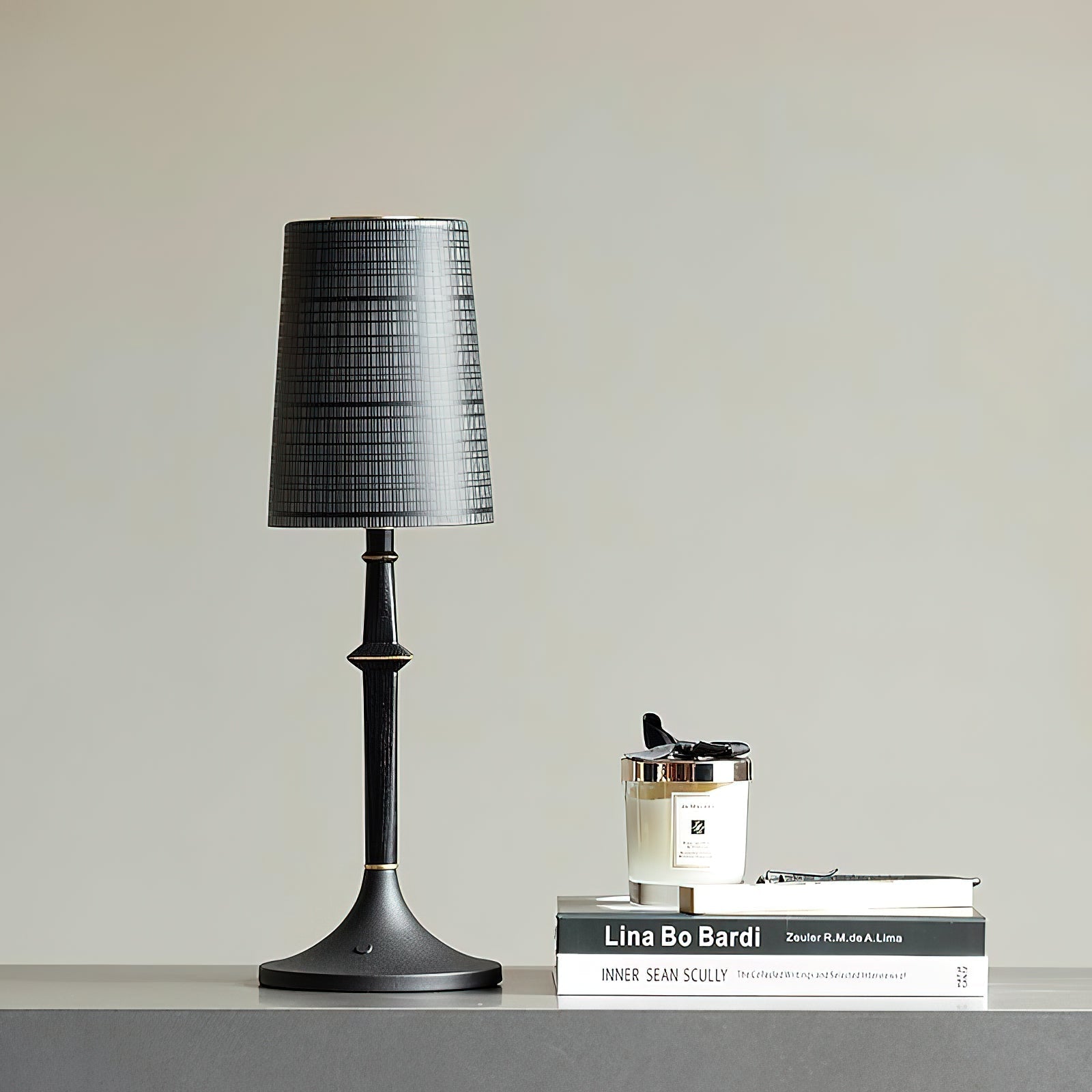 Close-up of the glass lampshade of the Devon Black Table Lamp.