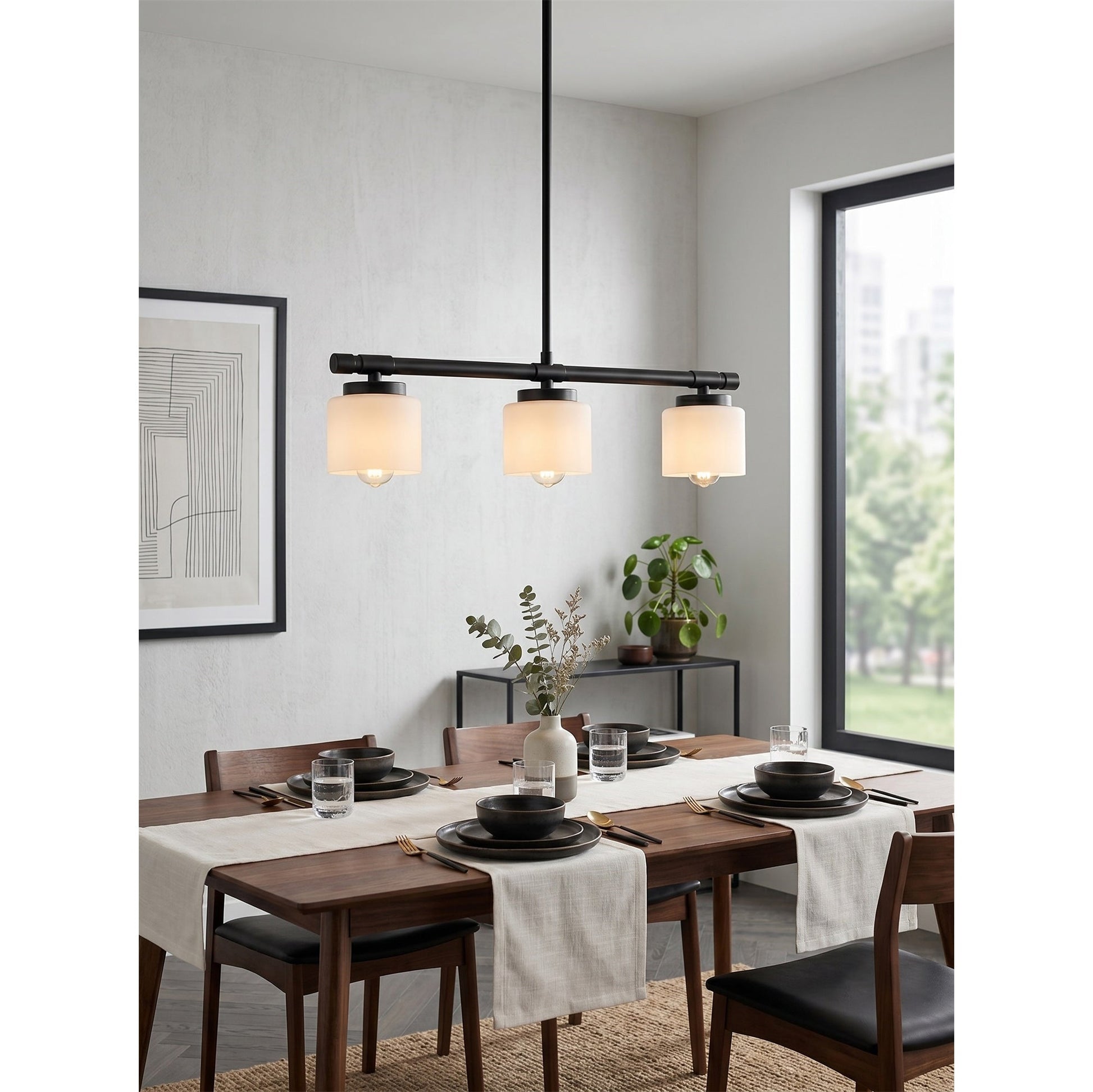 The pendant lamp installed on a sloped ceiling in a living space.