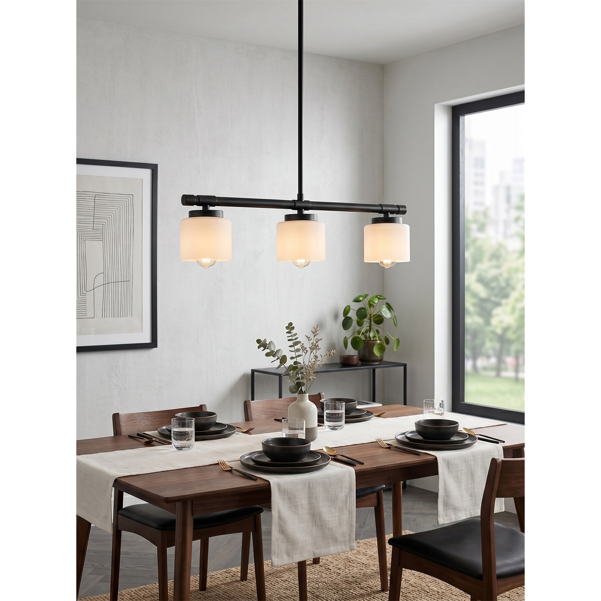 The pendant lamp installed on a sloped ceiling in a living space.