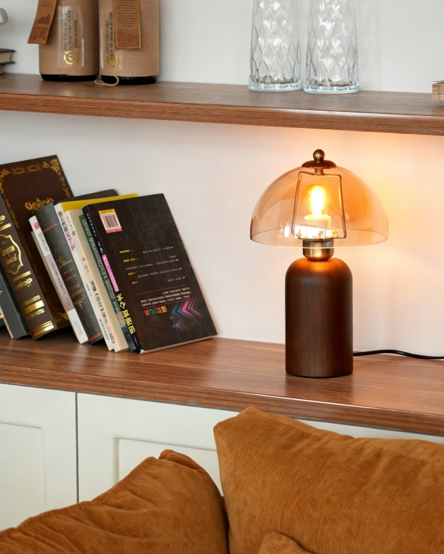A pair of Disko Table Lamps elegantly placed on a wooden credenza.