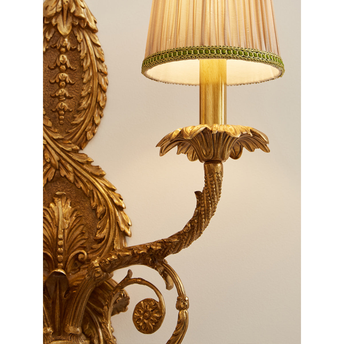 The lamp casting a soft, ambient light in a room.