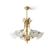 Dore Flower Chandelier with brass frame and clear glass shades.