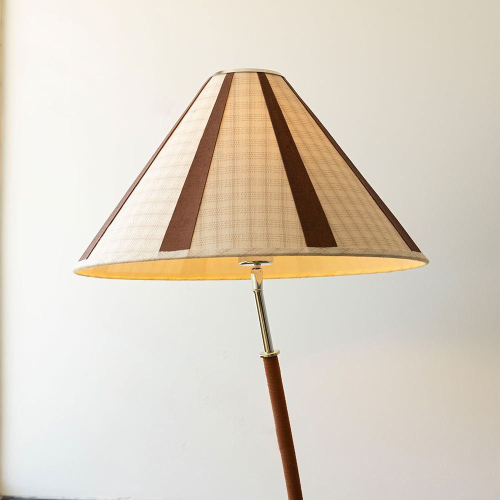The beige color variant of the Dornstab Floor Lamp.