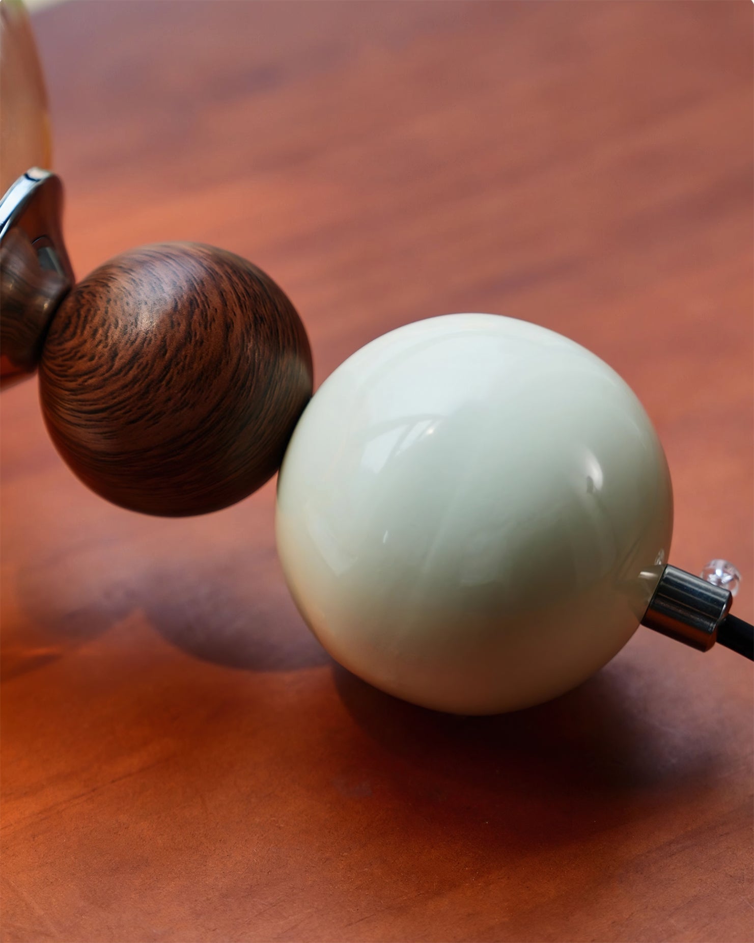 View from below of the Dot Pendant Light's G9 bulb base.