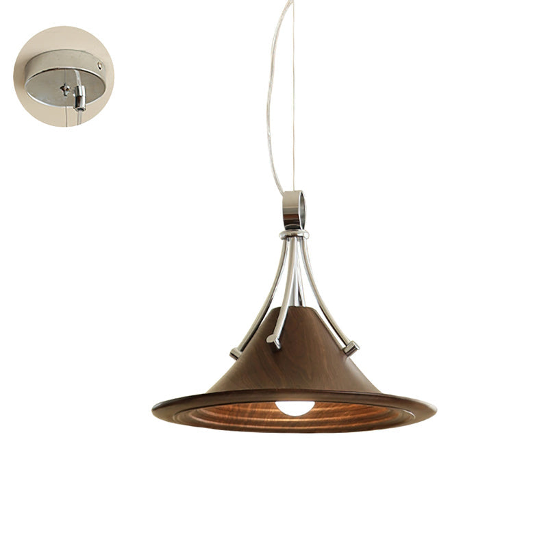 The Dottie Pendant Light installed above a round dining table.