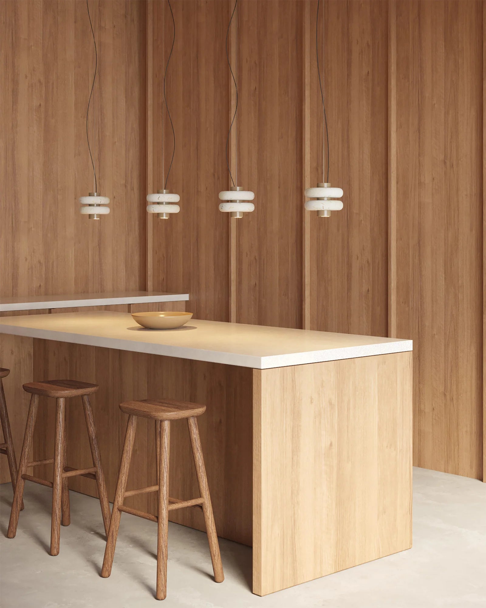 Duo Marble Pendant Lamp in beige, suspended from the ceiling.