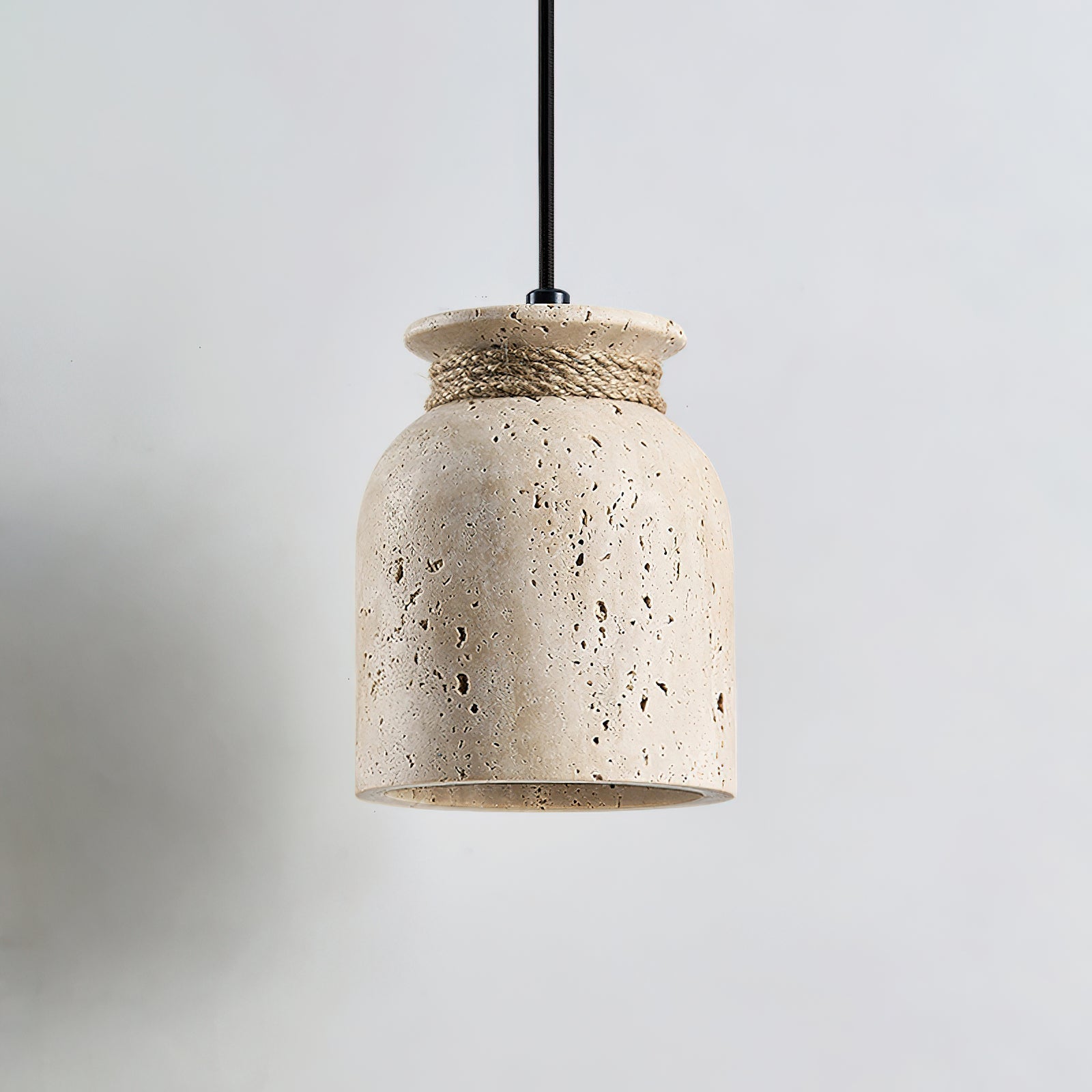Lifestyle image of the Easton Pendant Lamp in a minimalist living room.