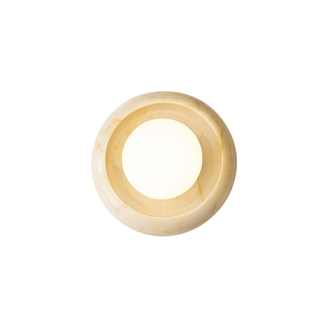 Front view of the Eclipse Marble Wall Sconce in a beige finish.