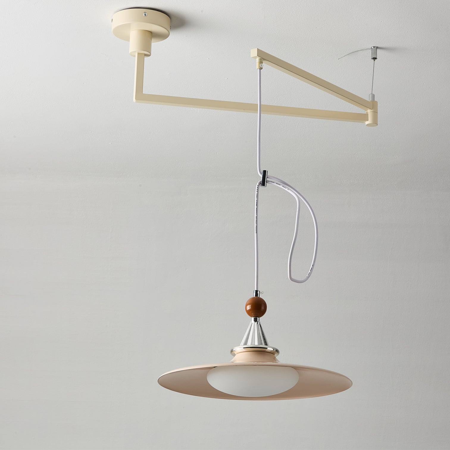 Eden pendant light in a bedroom setting.