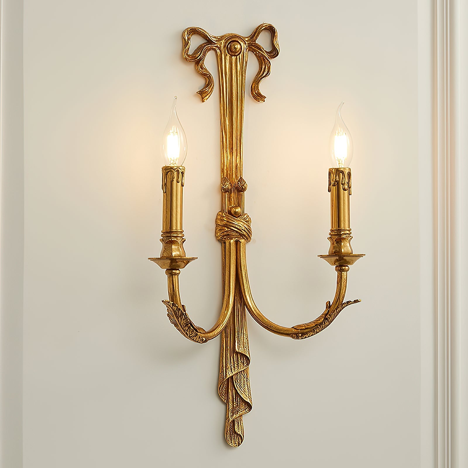 The elegant curves of the brass arms.