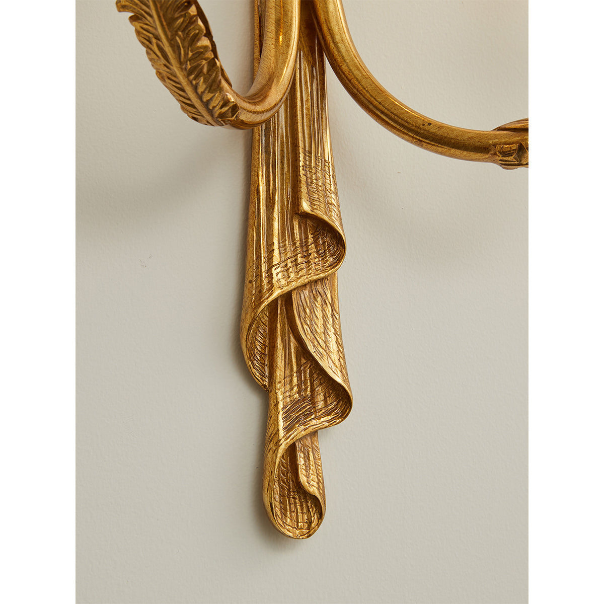 The lamp unlit, showcasing its brass construction.