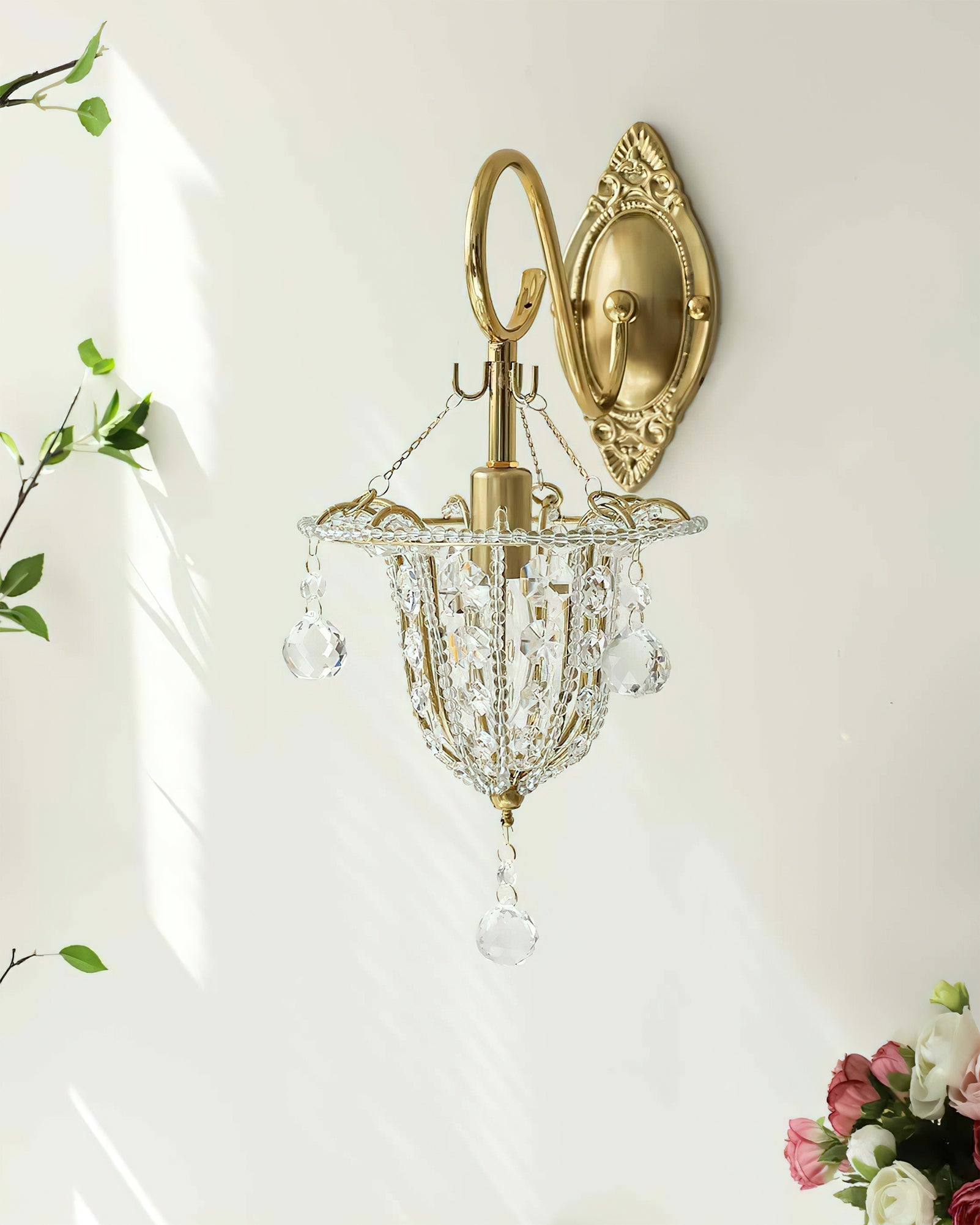 View from below the Eilers Wall Light, showing the bulb placement and crystal arrangement.