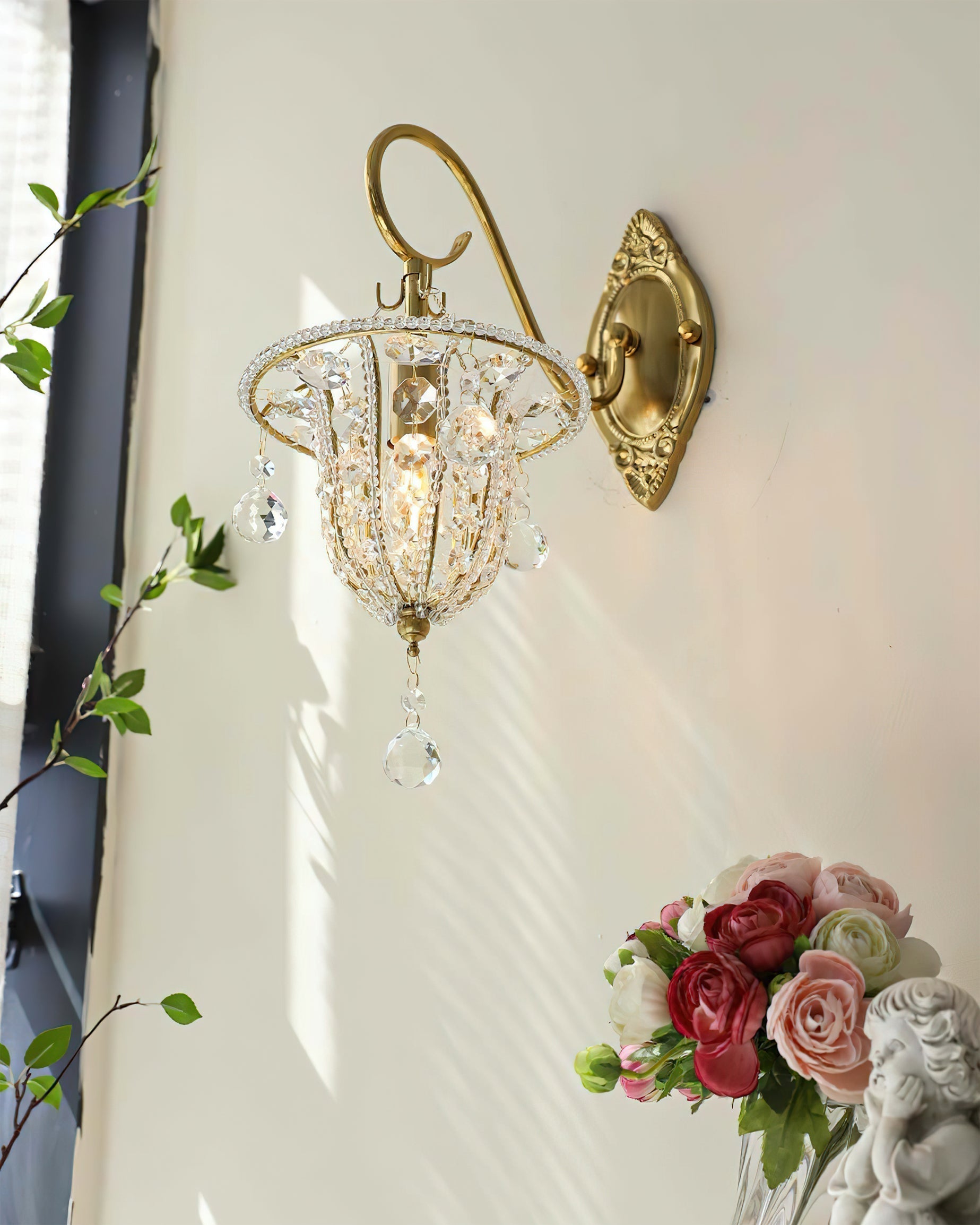 Detail shot of the gold finish on the metal frame of the Eilers Wall Light.
