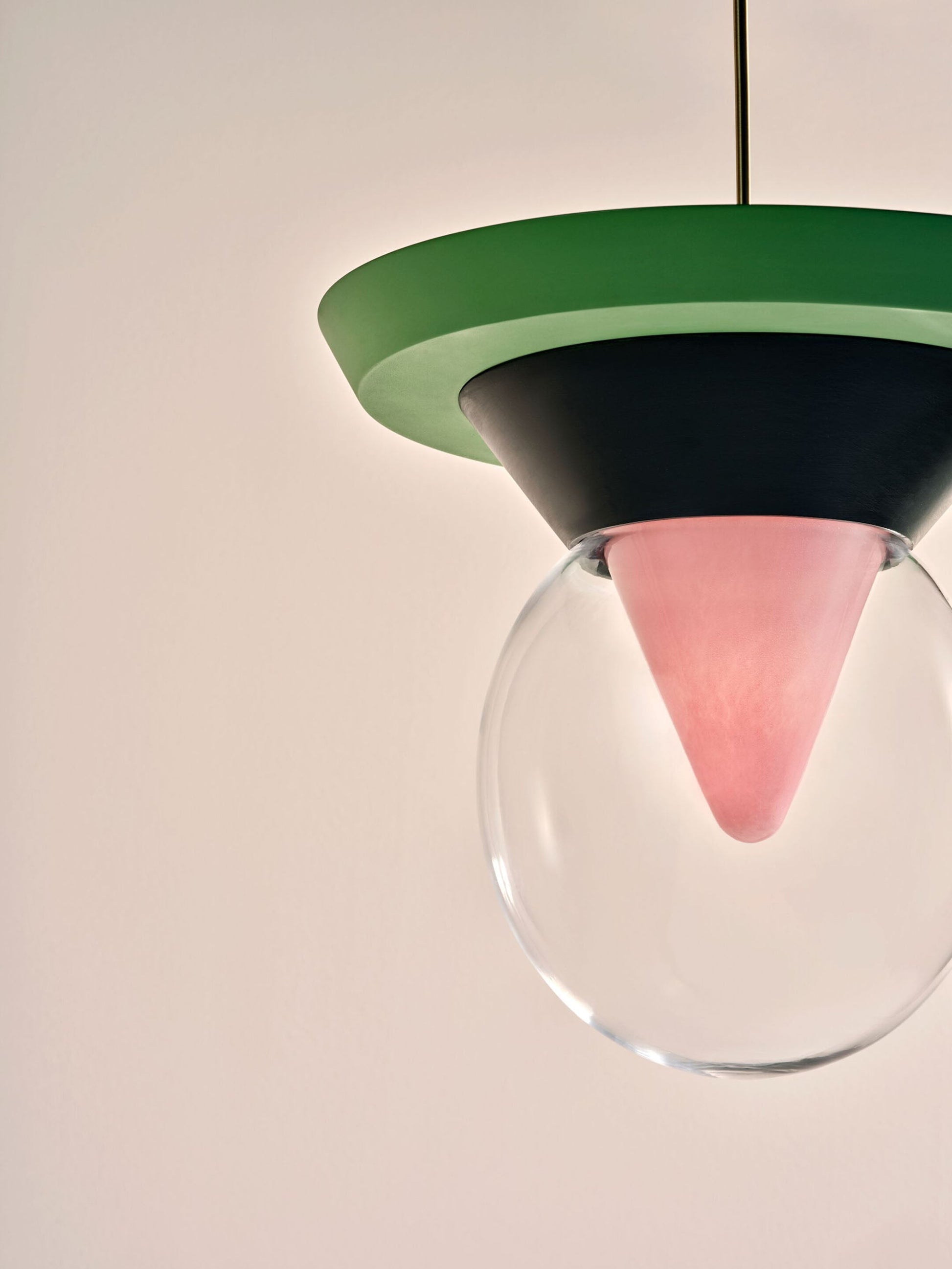 The Eirene lamp casting a soft, protective glow in a dim corner.