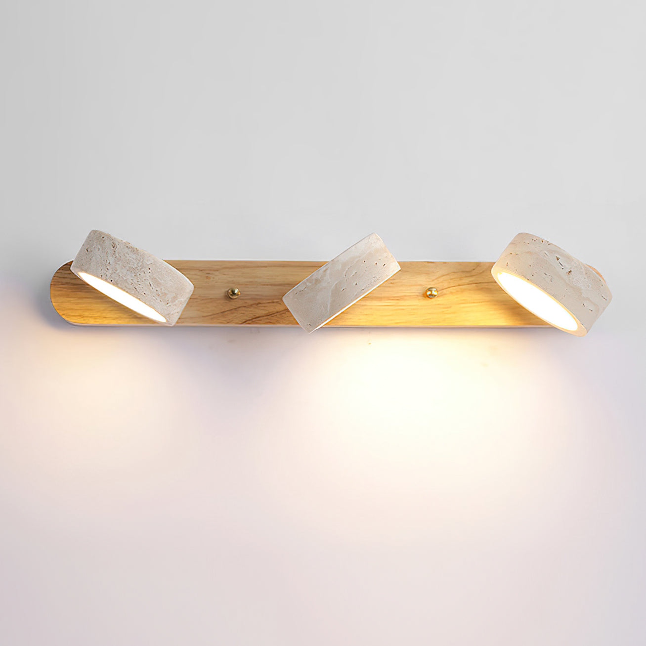 Full product shot of the 3-head lamp on a white background.