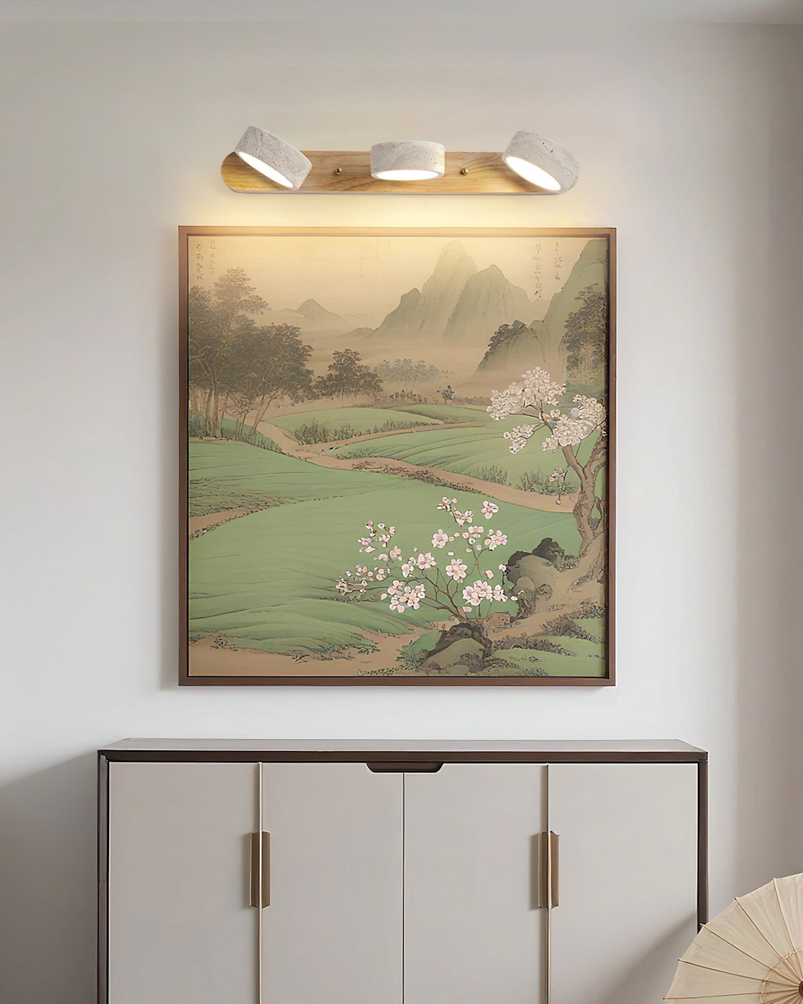 The 2-head Elias Travertine Wall Lamp, showcasing its compact size.