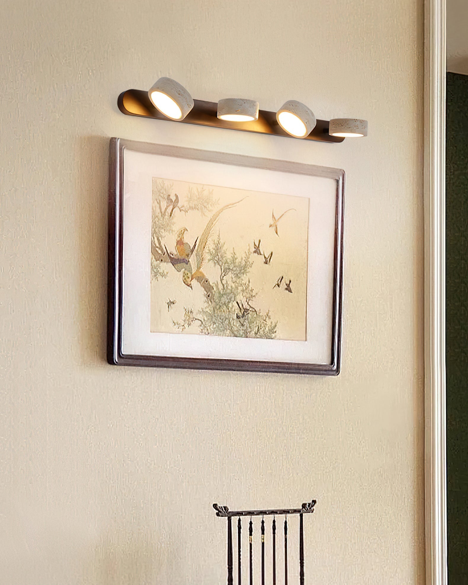 Lifestyle image of the Elias Wall Lamp in a modern living room.