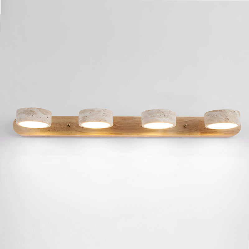 Elias Travertine Wall Lamp with neutral kelvin light.