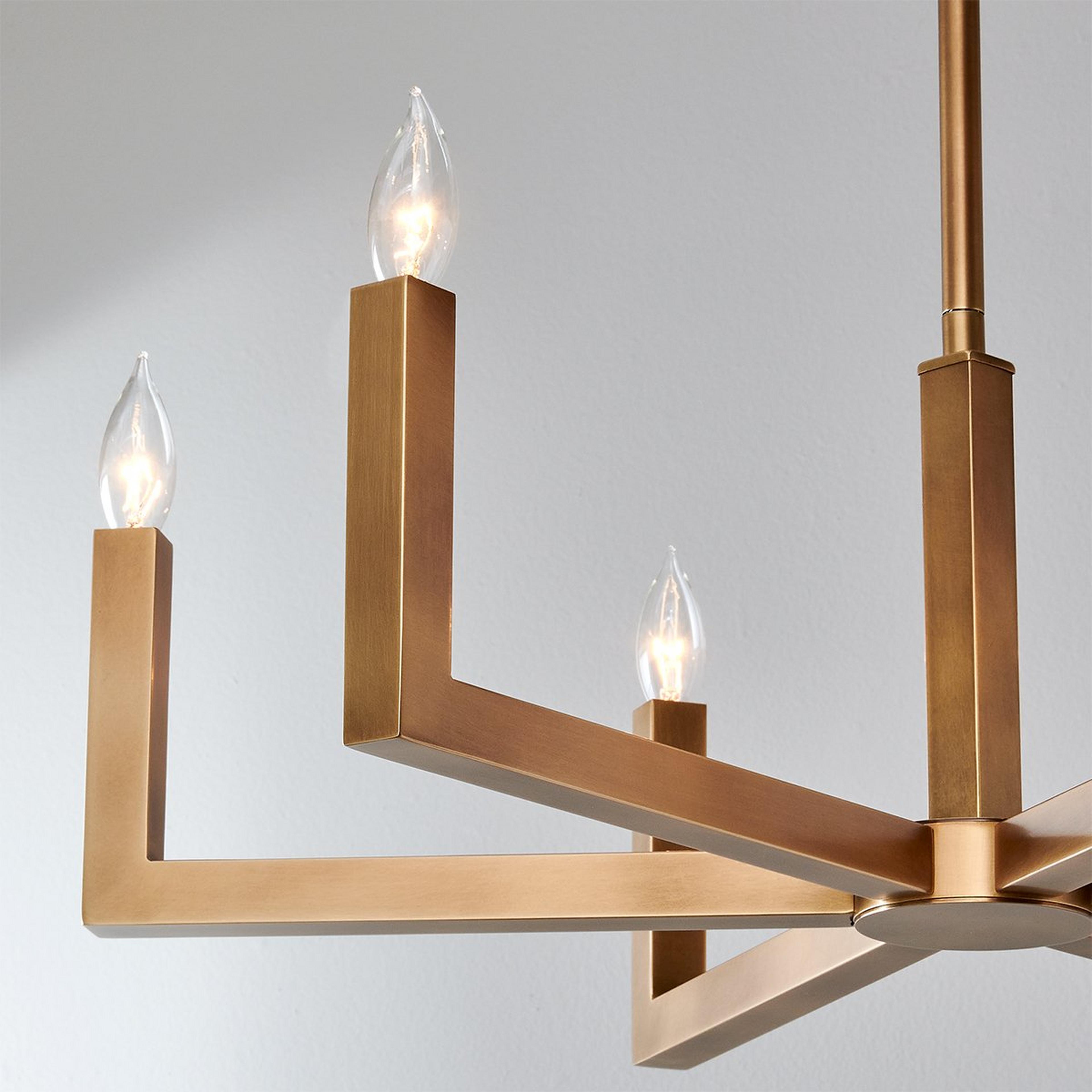 Angled shot of the Eliza Chandelier showcasing its six-light design.