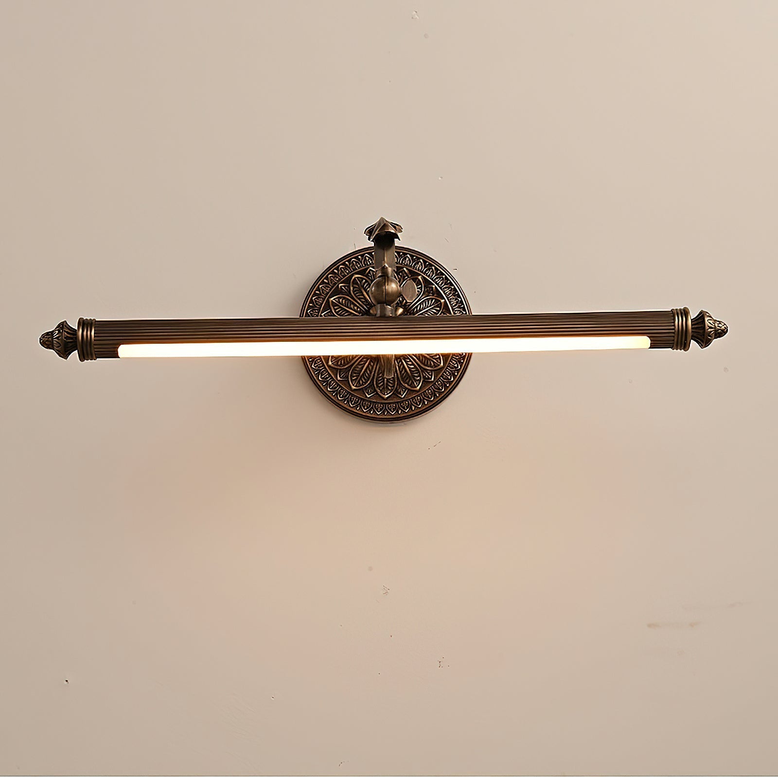 Close-up of the classical finial on the end of the light bar.