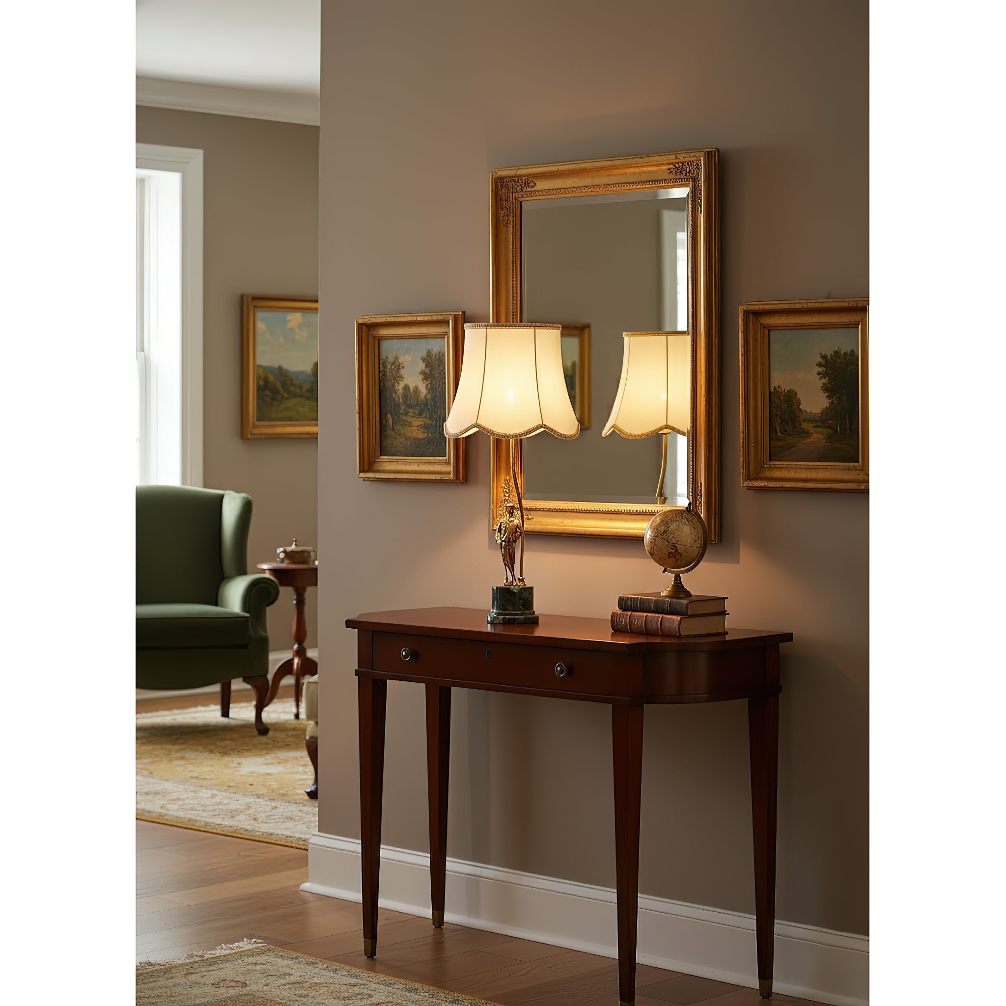 The Ellie Table Lamp illuminated in a study setting.