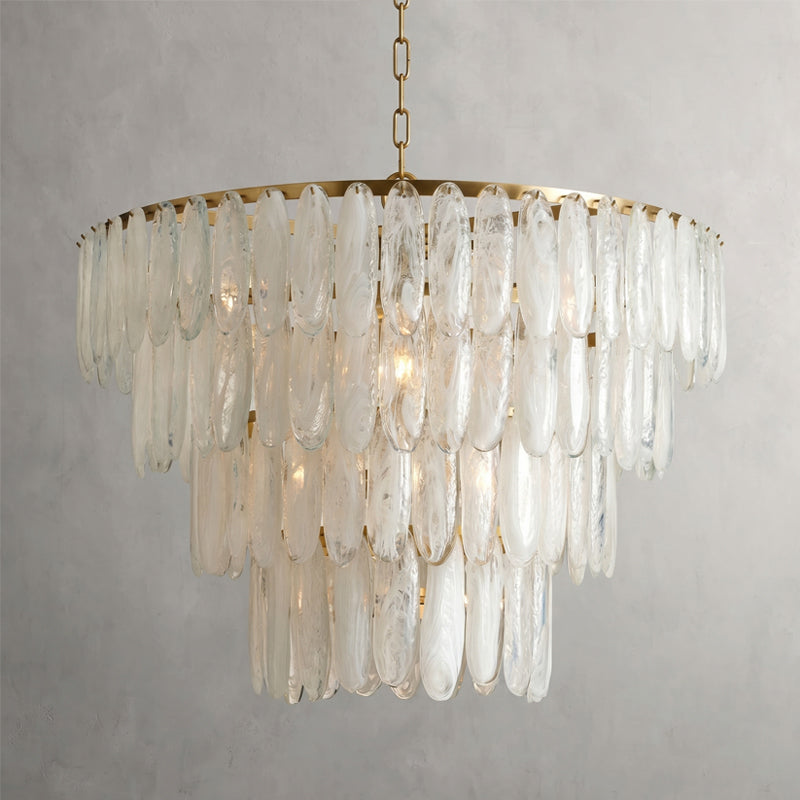The medium 60cm Ellington Chandelier hanging over a dining table.