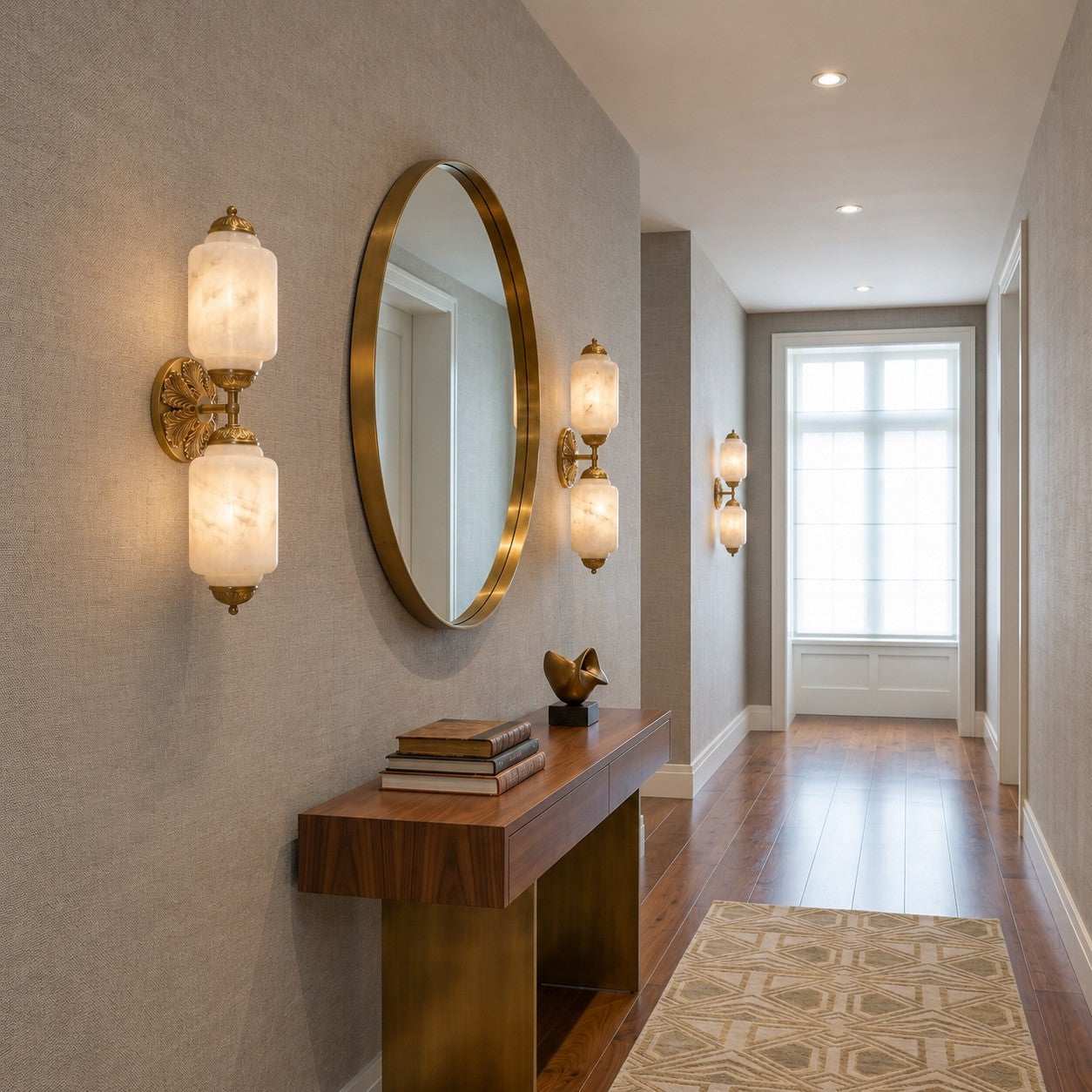 The wall sconce installed in a bathroom above a vanity.