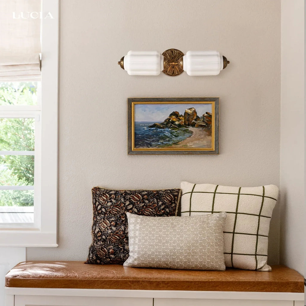 Eloise Scallop Glass Sconce shown in a pink finish.