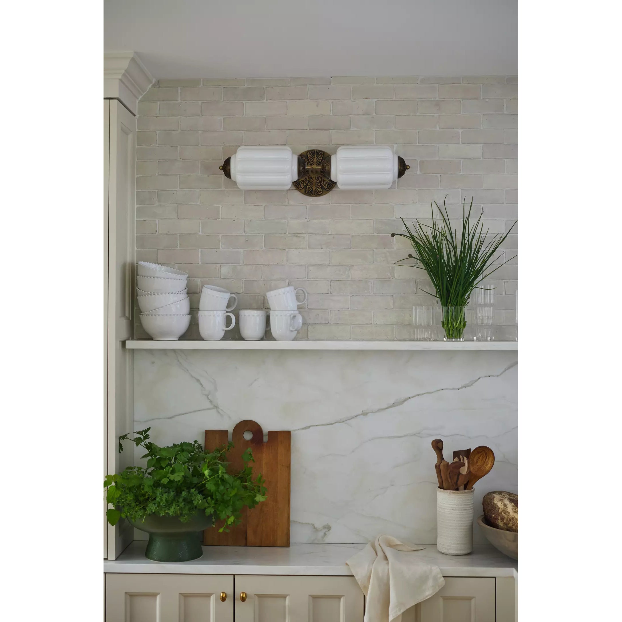 Side profile of the single-head white sconce.