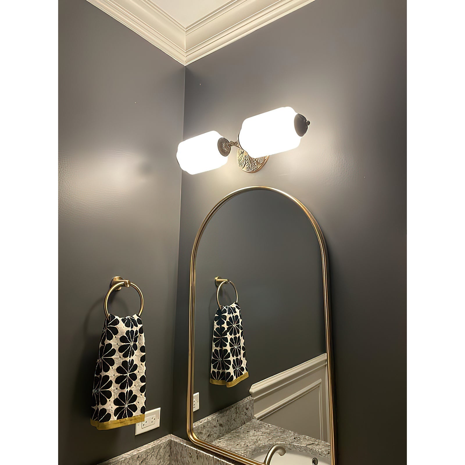 Eloise Sconce with a clear scallop glass shade.