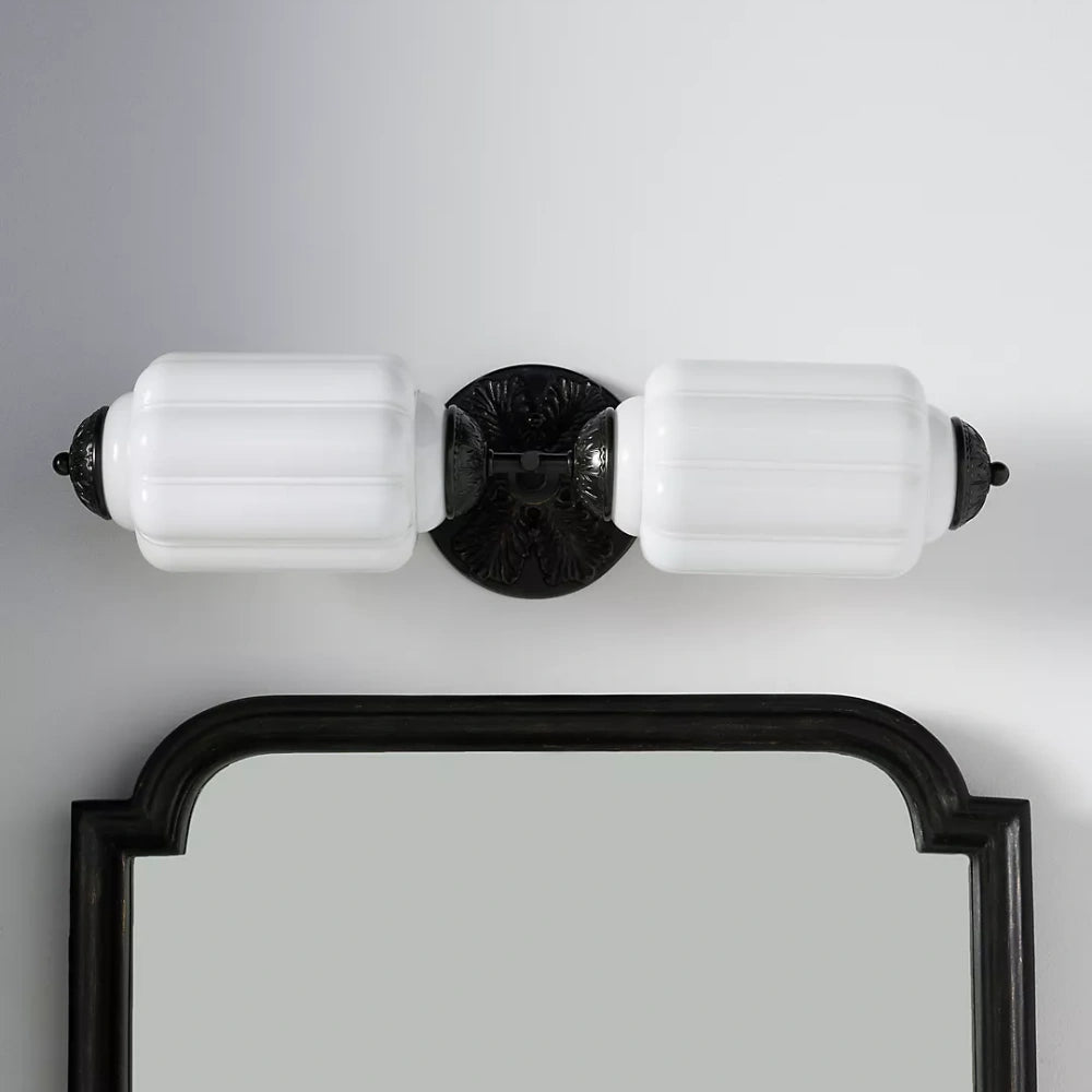 Eloise Sconce with a frosted scallop glass shade.