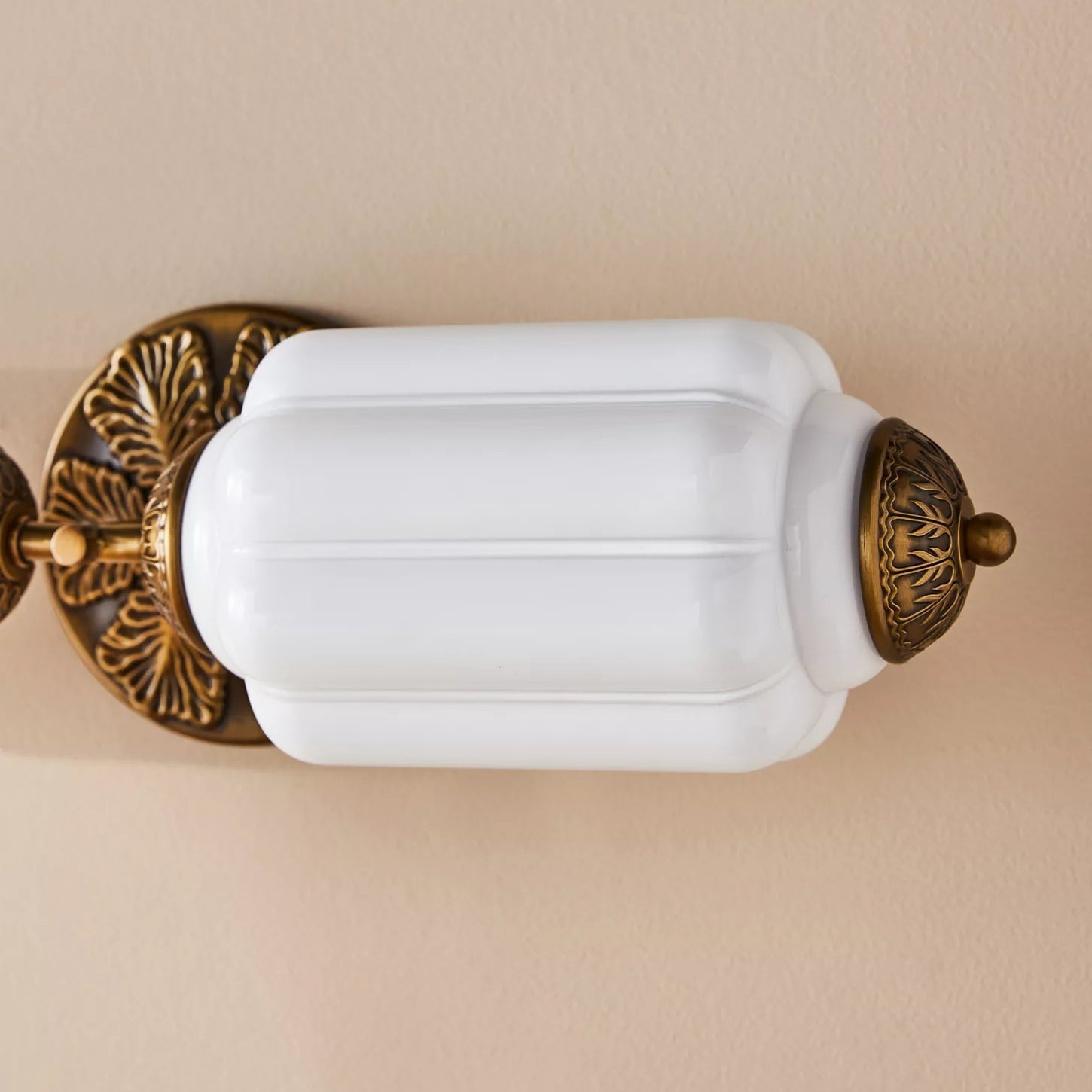 Close-up of the cool blue finish on the Eloise Sconce.