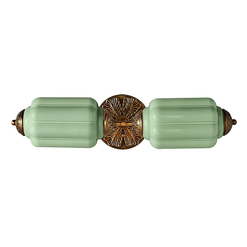 The two-head sconce installed horizontally above a bathroom vanity.