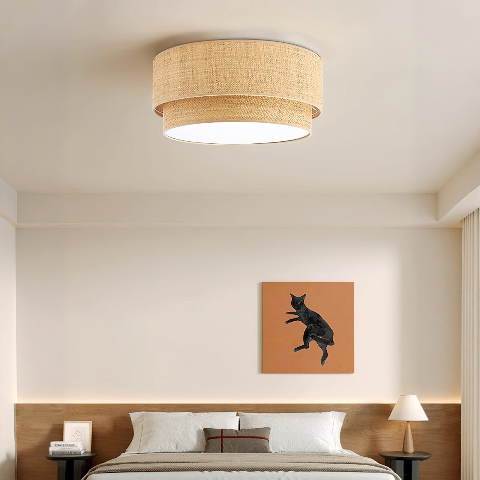 Emiko Ceiling Light shown illuminated in a dark room, casting a warm glow.