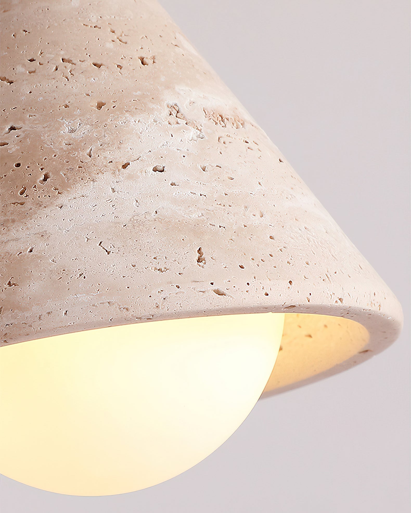 Emmet Ceiling Light in beige finish highlighting its natural stone pattern.