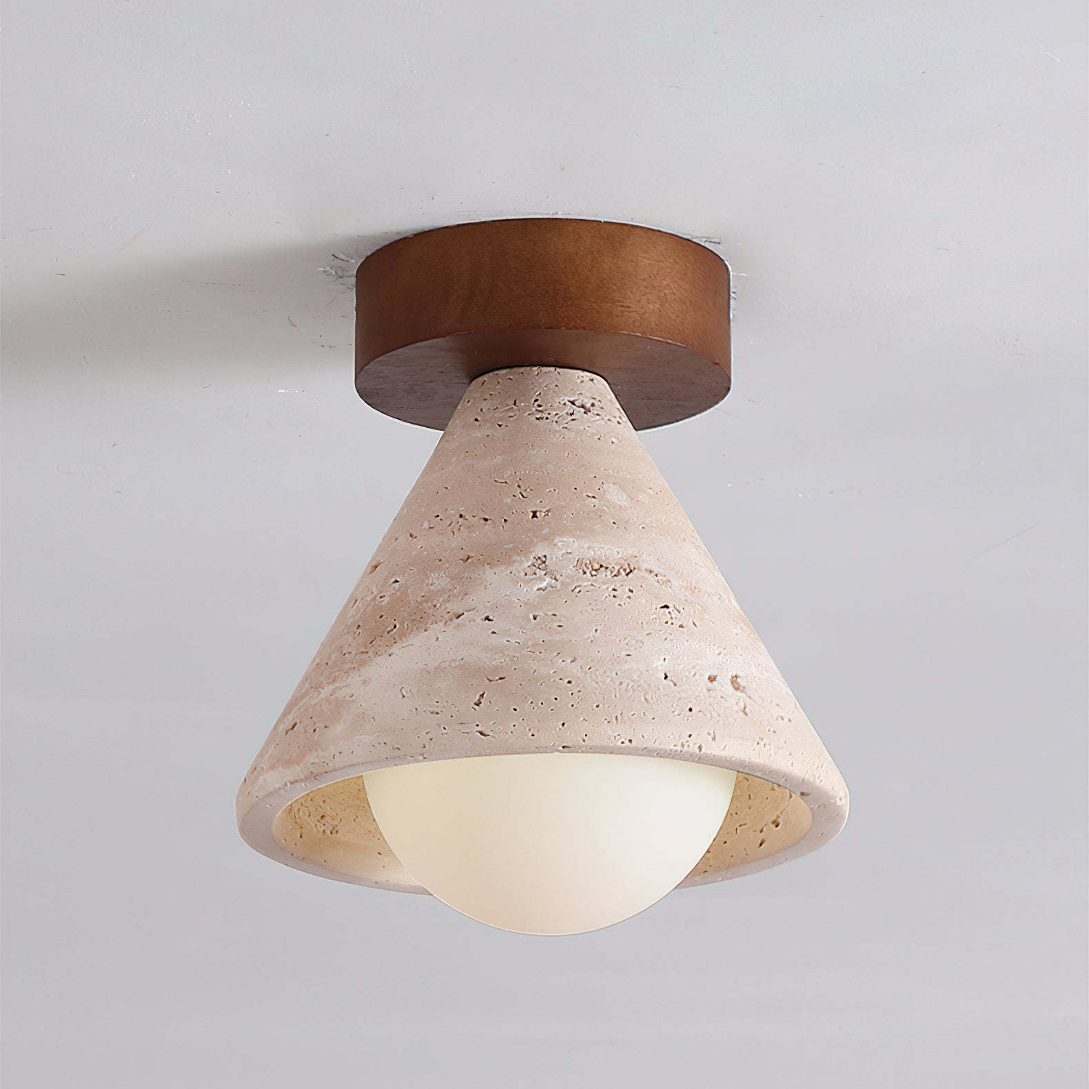 Lifestyle image of the Emmet Ceiling Light in a minimalist room.